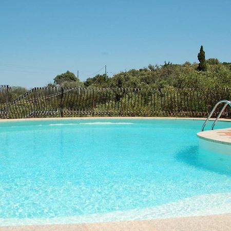 Hotel Li Graniti Baja Sardinia Extérieur photo