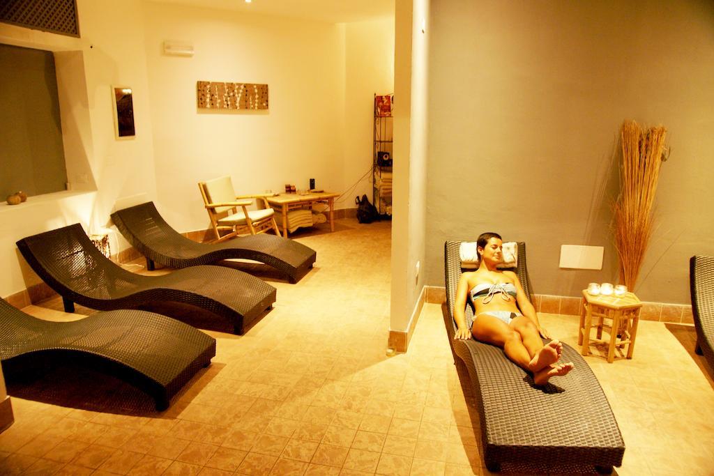Hotel Li Graniti Baja Sardinia Extérieur photo