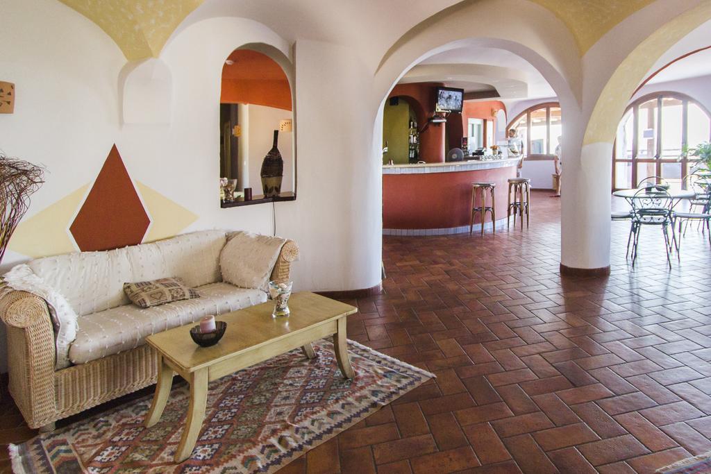 Hotel Li Graniti Baja Sardinia Extérieur photo