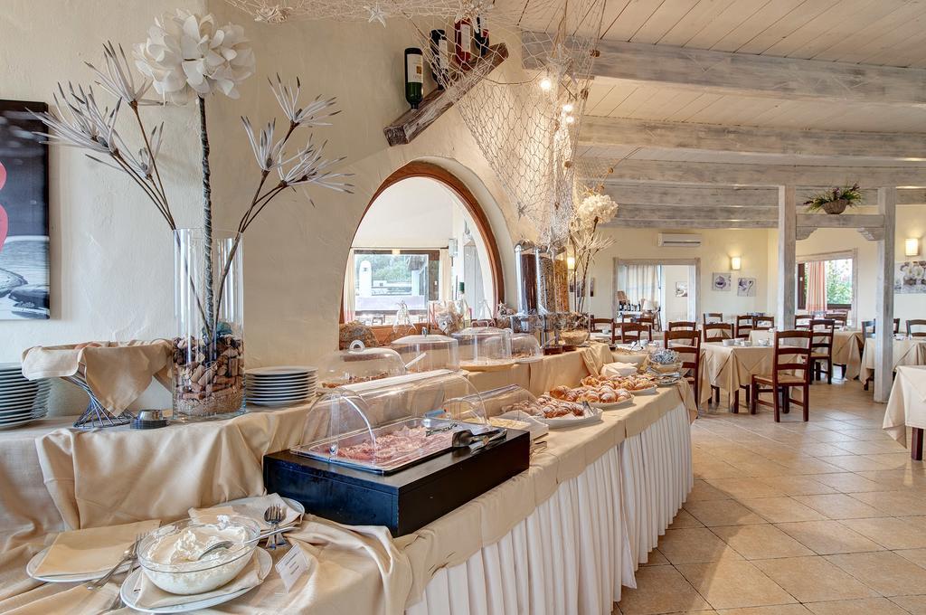 Hotel Li Graniti Baja Sardinia Extérieur photo