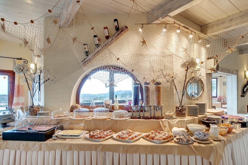 Hotel Li Graniti Baja Sardinia Extérieur photo